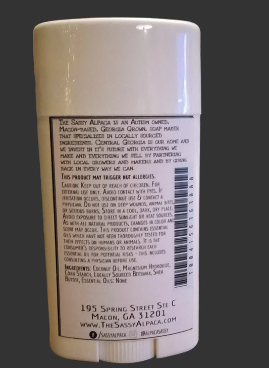 White cylindrical container with text on a dark background