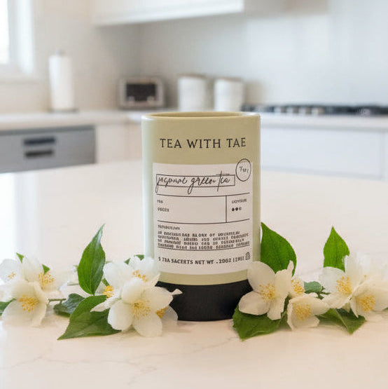 Tea canister on a wooden table with blurred background