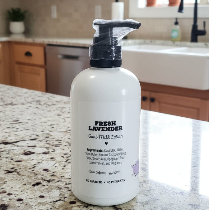 White bottle with black pump on a kitchen counter