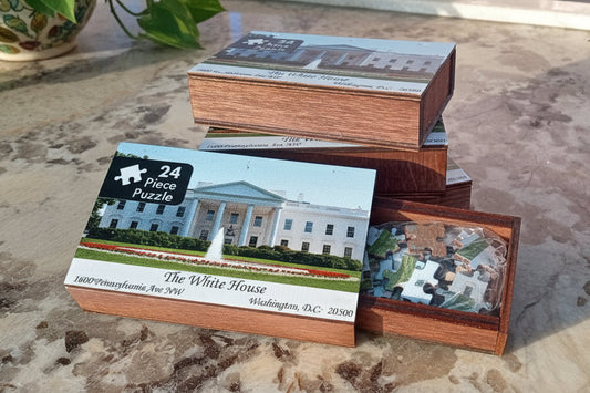 Mini jigsaw puzzle of 1600 Pennsylvania Ave in a keepsake box