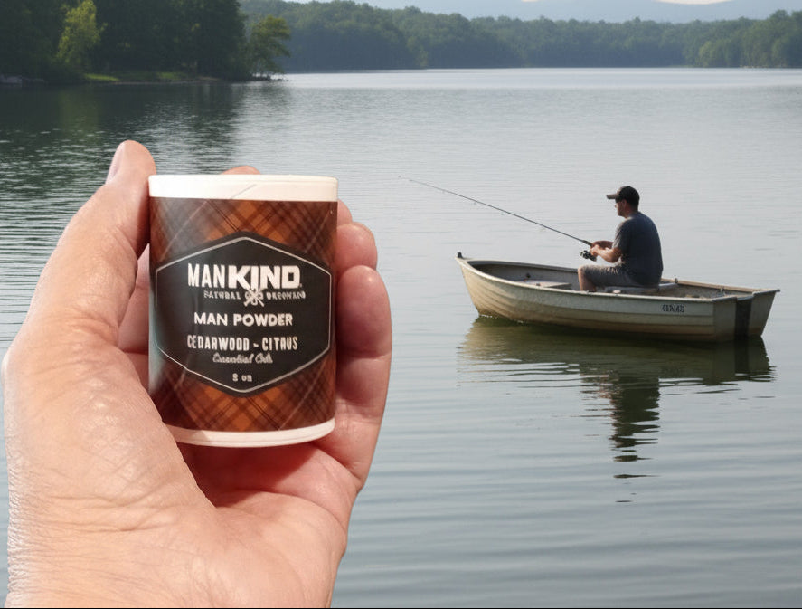 Hand holding a container of 'Mankind' brand powder in front of a pool table.